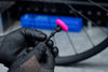MUC-OFF UCHWYT DO URZĄDZENIA ŚLEDZĄCEGO AIRTAG Tubeless Secure Tag Mount  2x 44mm Valves - Black