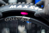MUC-OFF UCHWYT DO URZĄDZENIA ŚLEDZĄCEGO AIRTAG Tubeless Secure Tag Mount  2x 44mm Valves - Black